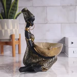 figurinedefemmeafricaineenresineavecbolenfeuilledor